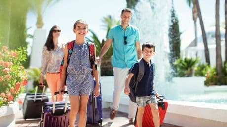Livid parents call for adults-only holidays ban as 'no kids is discrimination'