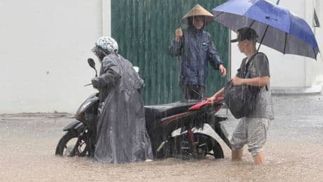 Heavy rain falls in parts of Southeast Asia after tropical storm blows into Vietnam