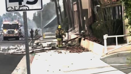 Police and firefighters respond to an explosion rocking the California city of Palm Springs
