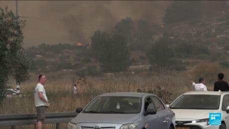 Israel reopens key roads as firefighters continue to battle blazes