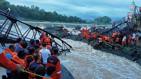 2 killed and 32 injured after a bridge collapses at a tourist destination in western India