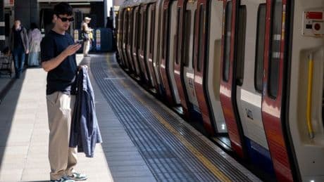 Passengers stuck on trains and platforms in sweltering heat after fire alarm