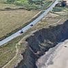 Fears one of Britain's most scenic roads just four metres from a cliff edge could crumble into the sea as drivers call it 'an accident waiting to happen'