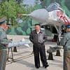Kim Jong Un does Top Gun: North Korean leader puts pilots through their paces as he calls on his people to step up preparations for war