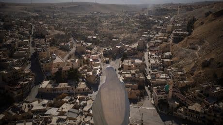 A church bombing leads Syria's Christians to consider leaving as foreign fighters remain