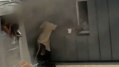 ​Incredible moment hero caretaker saves four babies from apartment fire in Paris