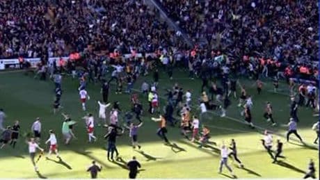 Bradford clash SUSPENDED with club seconds from promotion as fans storm pitch BEFORE full-time