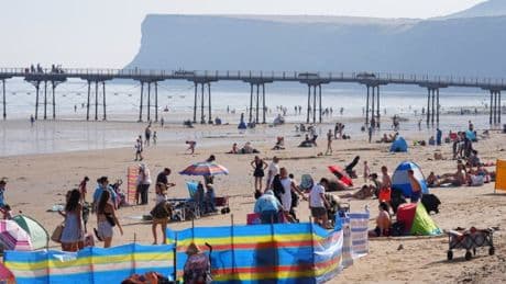 UK faces risk of thunderstorms but heatwave will continue into the weekend