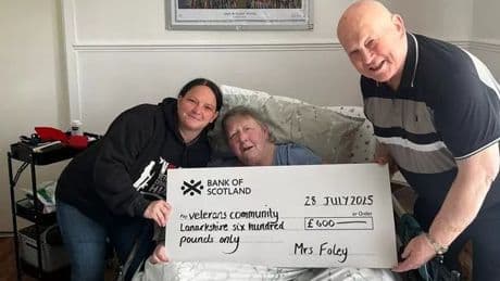 Raffle raises £600 for Veterans Community Lanarkshire after damage to defibrillator