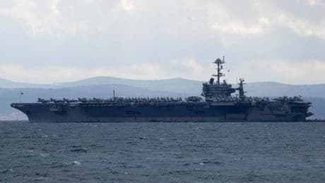 US Navy £54m fighter jet accidentally rolls off aircraft carrier and sinks in Red Sea
