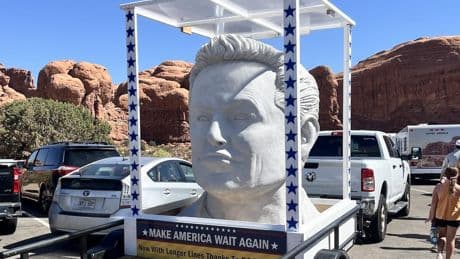 A giant Elon Musk bust was spotted at a Utah national park with a sign calling out DOGE cuts