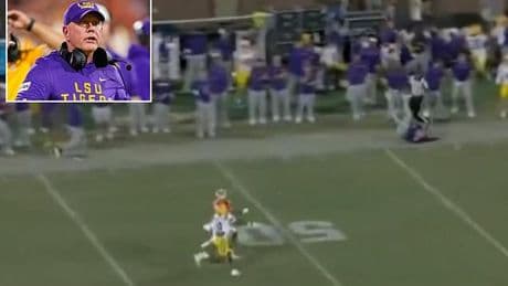 Wild moment $10m-a-year LSU coach Brian Kelly suffers scary fall on sideline after crashing into referee