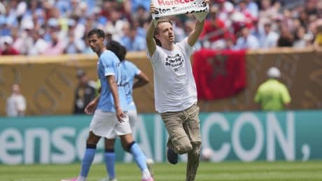Animal-rights protester runs onto field during Club World Cup match with anti-Morocco message