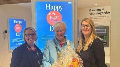 Nationwide East Kilbride fundraiser coins in cash for dementia specialist nurses