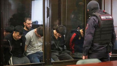 Suspected gunmen go on trial over concert hall massacre