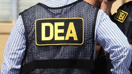Longtime DEA informant charged in alleged scheme to extort high-level cocaine traffickers