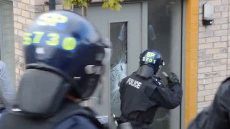 Footage shows cops ram doors as seven arrested in serious and organised crime crackdown