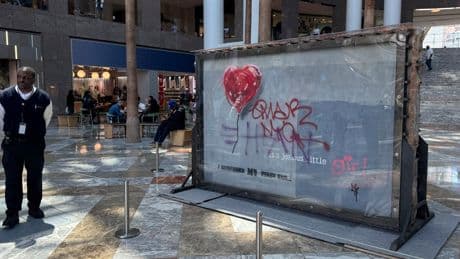 Banksy's ‘Broken Heart' painting defaced on a Brooklyn wall is up for sale