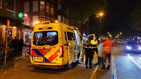 Drie bewoners en hond gered uit brandend pand Amsterdam