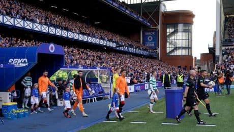 Rangers fans unveil giant ‘rebel scum’ banner with picture of Graeme Souness with shotgun before clash with Celtic