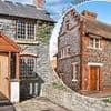 The hidden gem homes you can buy for less than £150,000 revealed by property experts: From a thatched cottage in an unexpected place to city centre flats... but move fast!