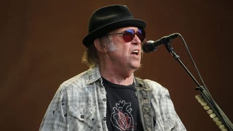 Neil Young’s Glastonbury headline set to be broadcast live on BBC after U-turn