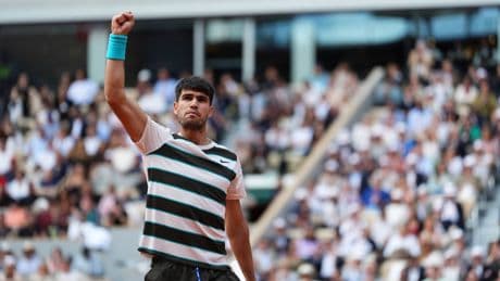 AP PHOTOS: Alcaraz beats Sinner in stunning comeback in French Open final
