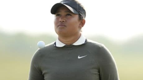 Heroine golf star survives botched burglary and lost clubs to become a star at US Open