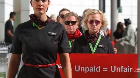 How much work are Air Canada flight attendants not getting paid for?