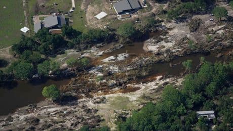 Searchers in helicopters and on horseback scour Texas flood debris for the missing