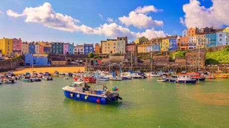 UK seaside town with pastel-coloured houses and four beautiful beaches