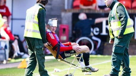 Aberdeen's MacKenzie requires stitches after being hit by seat thrown by supporter