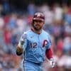 Marchan leads Harper-less Phillies over Braves 5-4 in doubleheader opener for 23rd win in 29 games