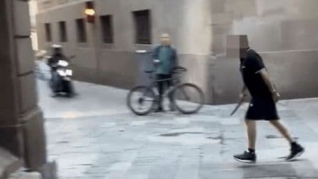 Horror moment man with huge knife runs through Barcelona streets as tourists flee