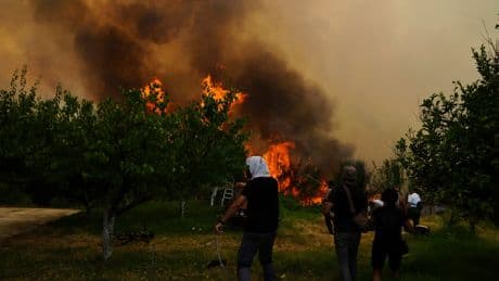 At least 3 dead and thousands displaced as wildfires rage across southern Europe