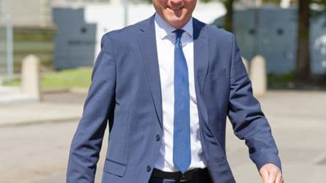 Top Grand National horse trainer to stand trial after ‘attacking man during bust up at his countryside stables’