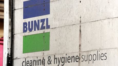 Bunzl acquires more businesses as profits dip in first half