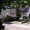 Moment fly-tipping couple are caught dumping piles of rubbish on country road - as pair are fined £3k