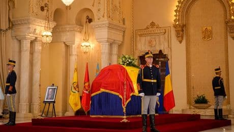 Ion Iliescu's death exposes Romania's deep divisions over his legacy as former leader laid to rest
