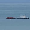 1 person dies when a boat overloaded with migrants sinks in the English Channel
