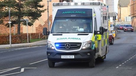 Driver, 81, treated at scene after car crashes into burn in East Kilbride