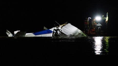 Three killed after plane crashes into Nebraska river with wreck pulled from water as mystery surrounds deadly disaster