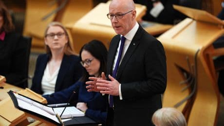 First Minister John Swinney announces peak train fares in Scotland to end