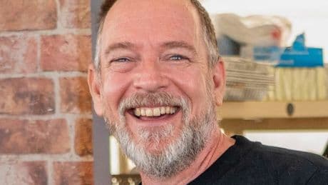 EastEnders' Adam Woodyatt cosies up to mystery woman for first time since divorce