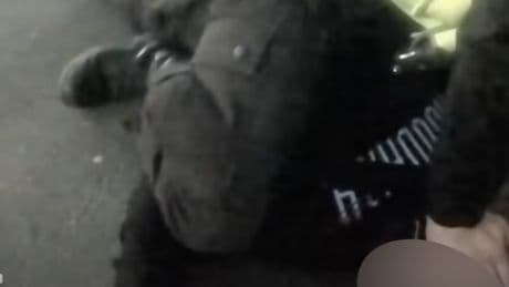 Police officer pins boy to floor and screams in his face in shocking body worn camera footage