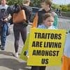 Ireland's asylum backlash: Huge crowds stage anti-migrant march as protesters blame Irish government for 'inviting the whole third world to come in' after 300% rise in asylum seekers