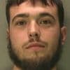 Manhunt for seaside murder suspect: Police release mugshot of 22-year-old wanted over death of man 25, found with fatal head injuries in house