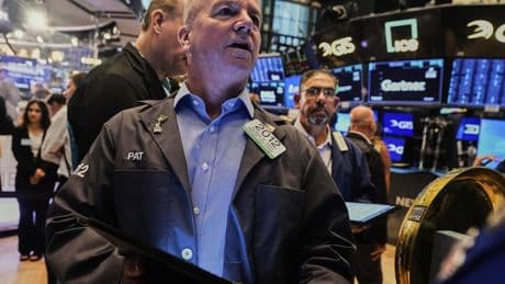 U.S. stocks near their record as oil prices tumble and stocks rally worldwide