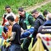 Cheese rolling competitor is taken to hospital after being injured racing after 3kg wheel of Double Gloucester in renowned Bank Holiday tradition
