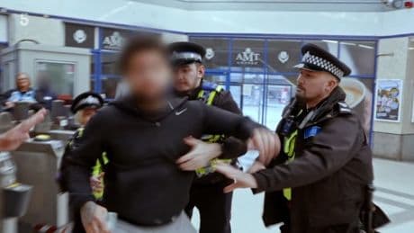 Fare dodger barges his way through barriers – and straight into arms of police